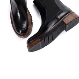 bota de cuero negro para mujer